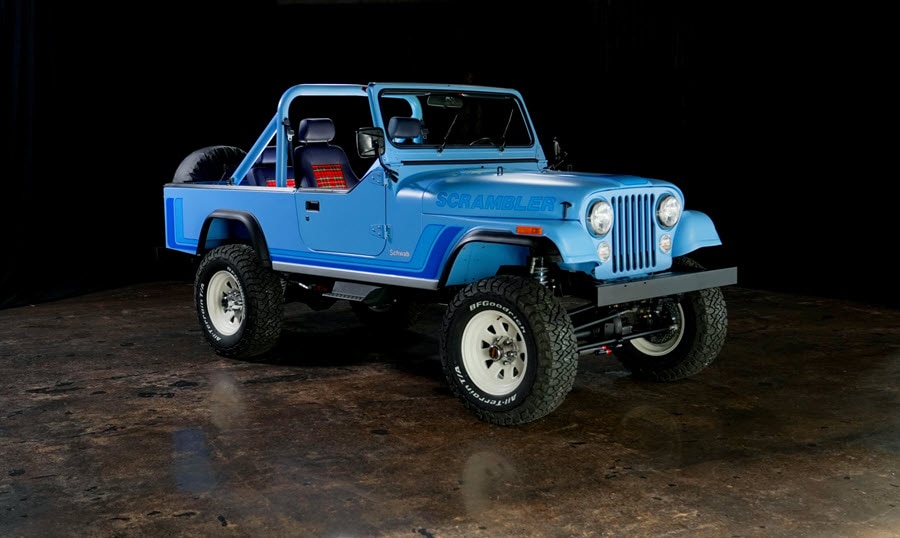 A blue jeep with tartan interior.