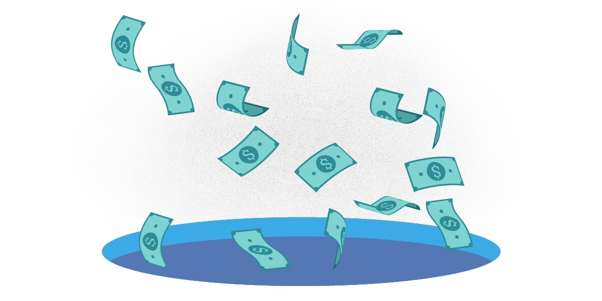 Illustrated dollar bills falling into a hole