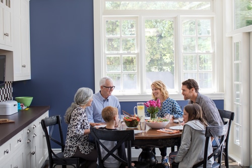 multigenerational family around dining table