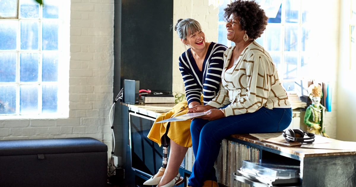 two women laughing
