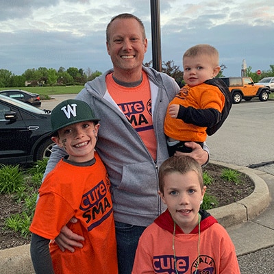 Schwab Dad Brad with his children.