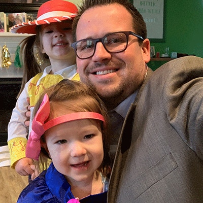 Schwab Dad Brett with his children.