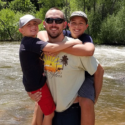Schwab Dad Greg and his sons.