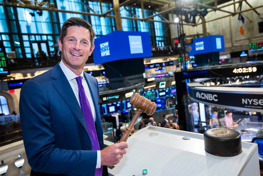 Schwab CEO ringing the NYSE closing bell