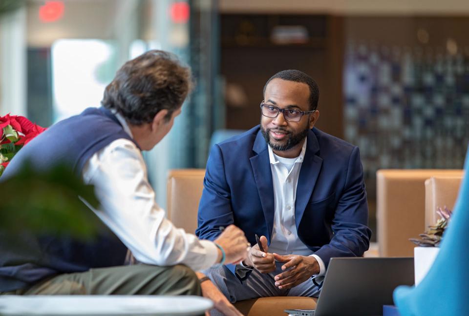 Two men in a discussion.